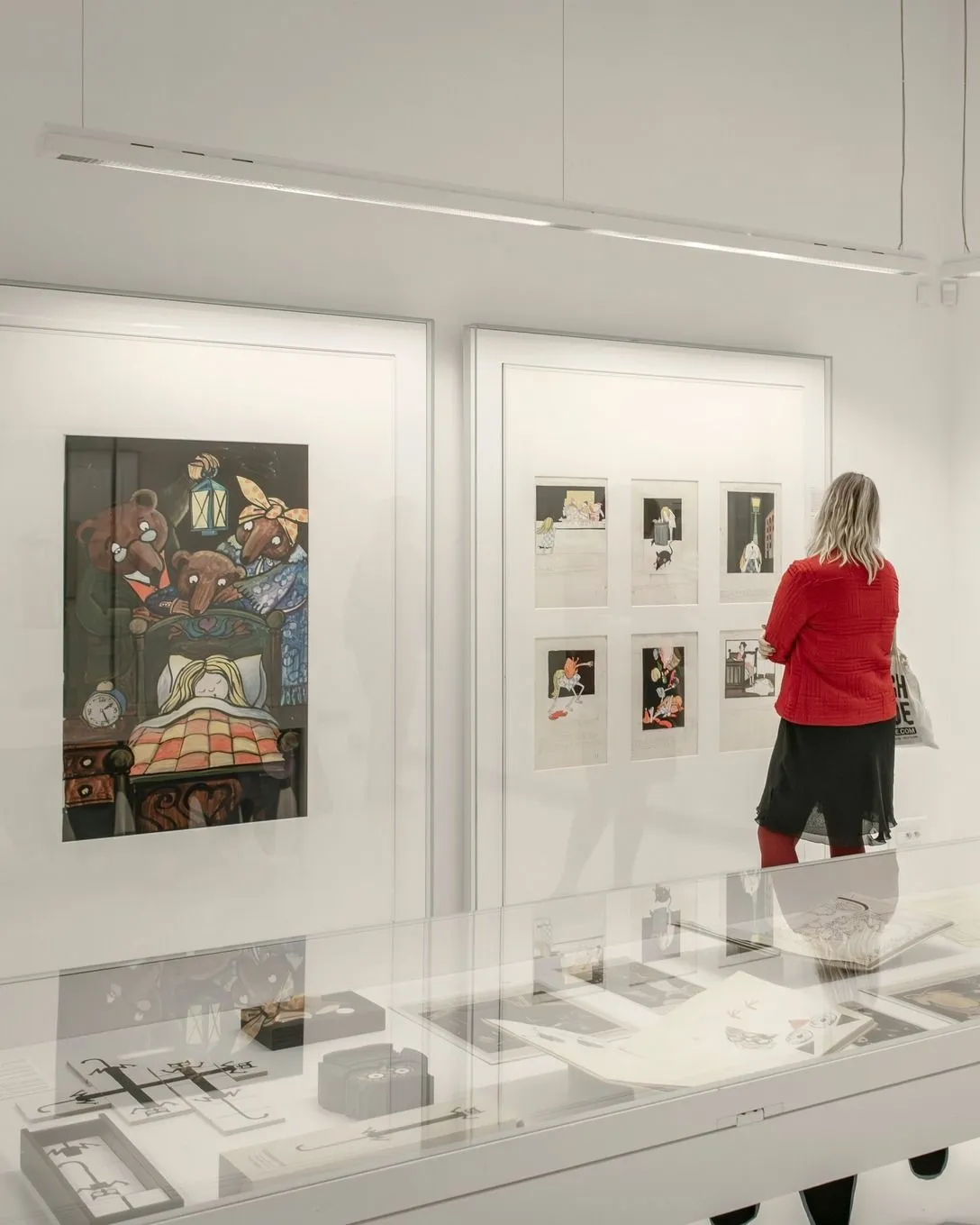 Interior view of art galleries featuring framed sketches at the Tomi Ungerer museum