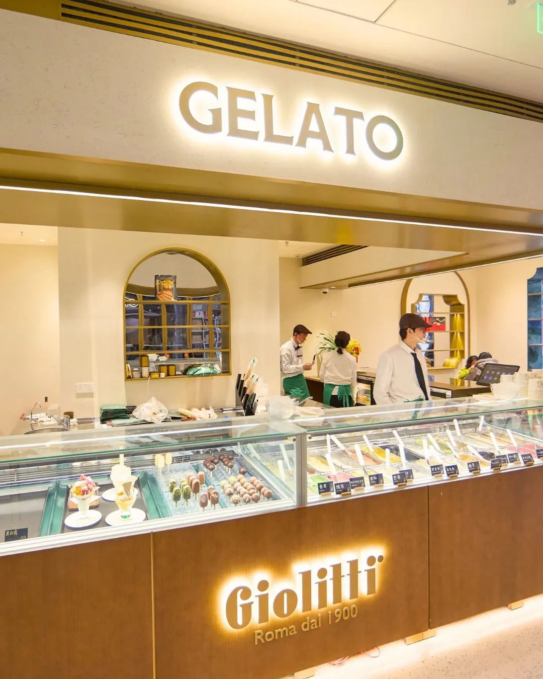 Colorful tubs of artisan gelato in a Roman shop