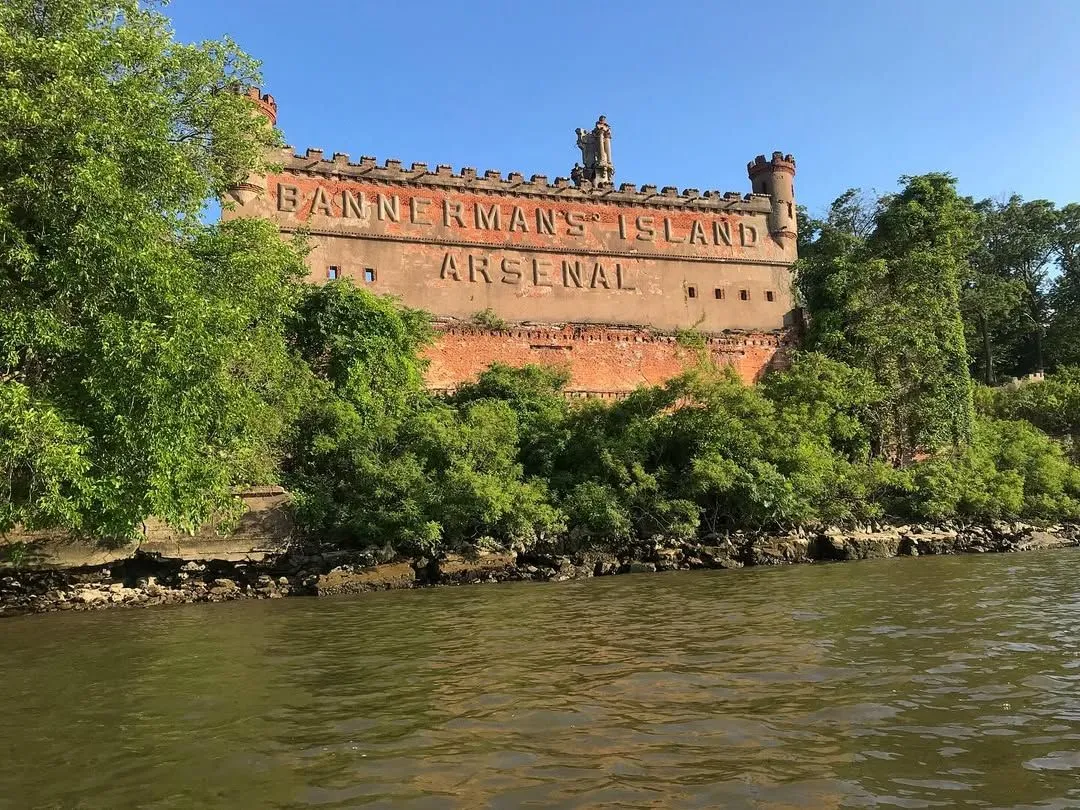 Kayaking view of Bannerman Castle ruins on Pollepel Island during summer