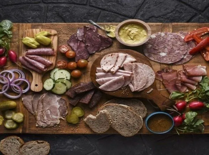 Traditional Bavarian snack platter with cheese and bread in a beer garden