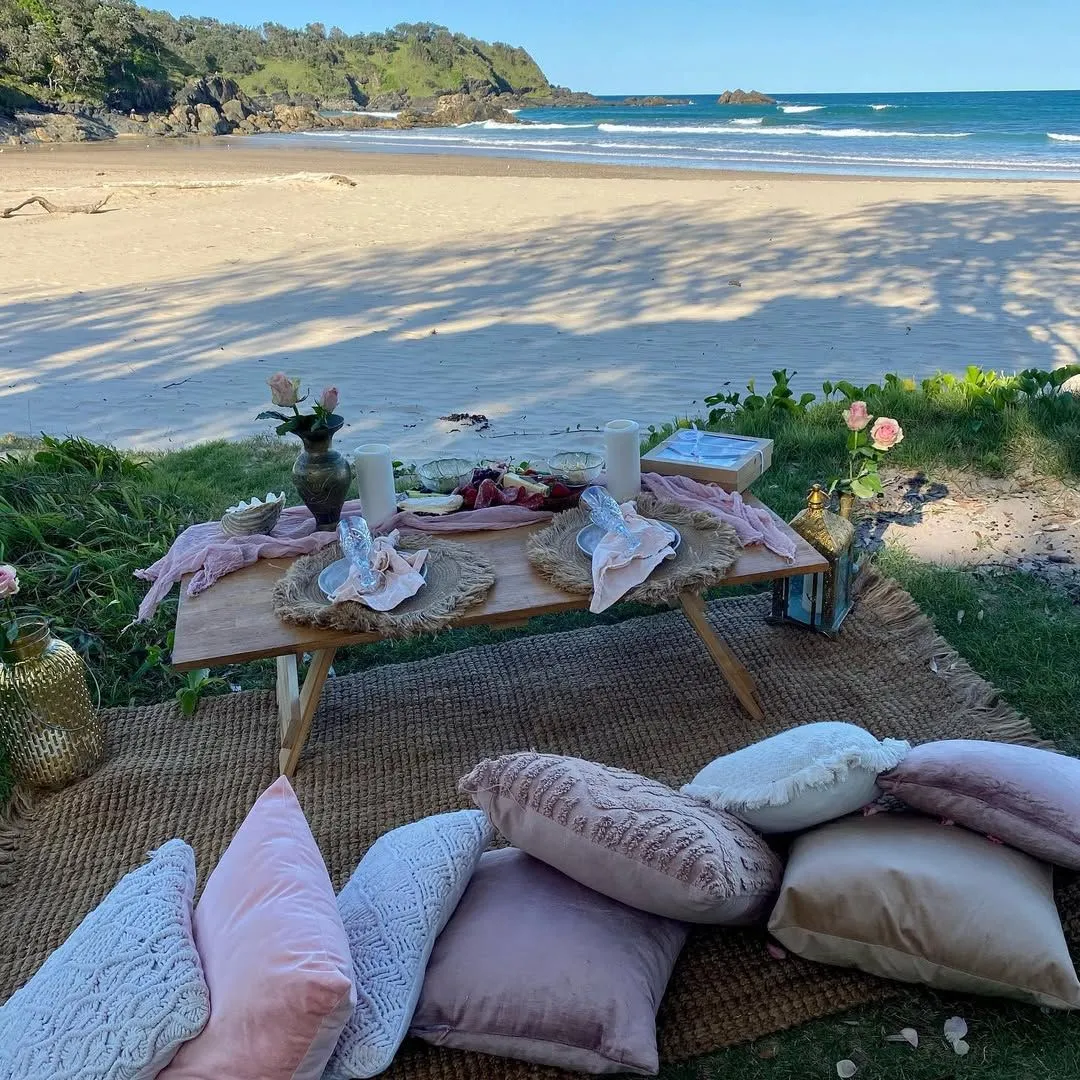 A romantic and budget friendly picnic on the sand at Titikaveka Beach