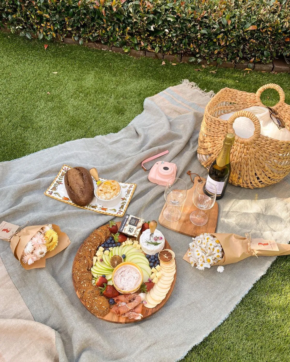 Picnic lunch with pastries on a bench in Luxembourg City