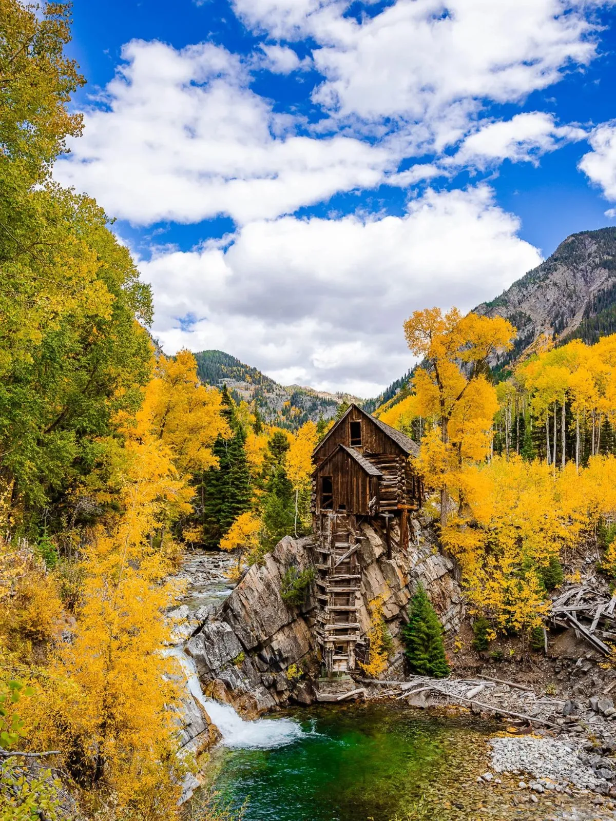 The wooden Crystal Mill perched above the river in Colorado