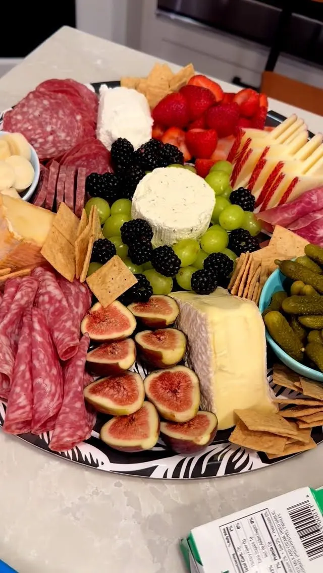 Gluten free Italian appetizer spread with wine cheese and cured meats