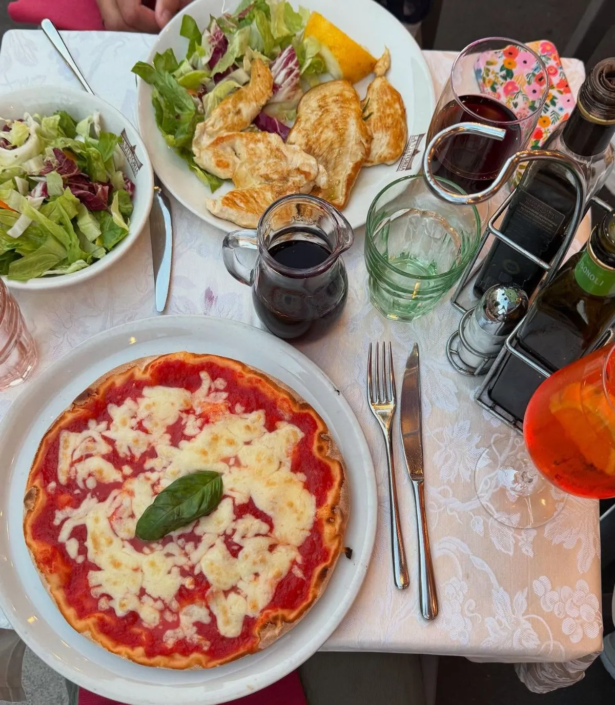 Fresh slice of gluten-free pizza al taglio with mozzarella and basil in Rome