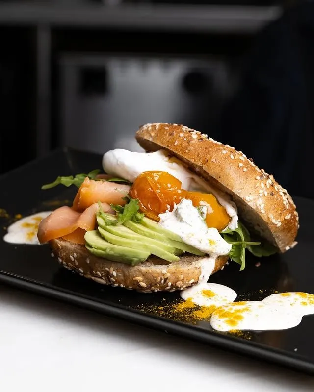 Delicious street food meal served on a rooftop table at LX Factory in Lisbon