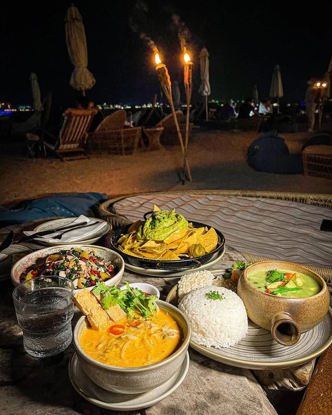 Couples dining at the festive Muri Night Market in Rarotonga