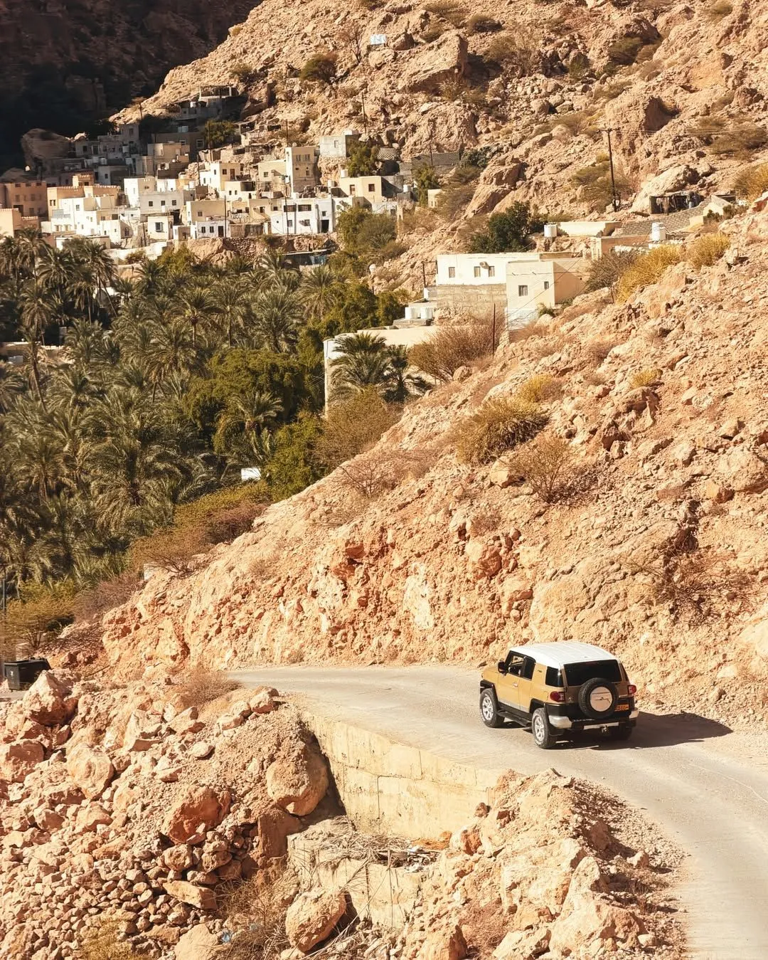Winding steep road through the mountains of Wadi Tiwi