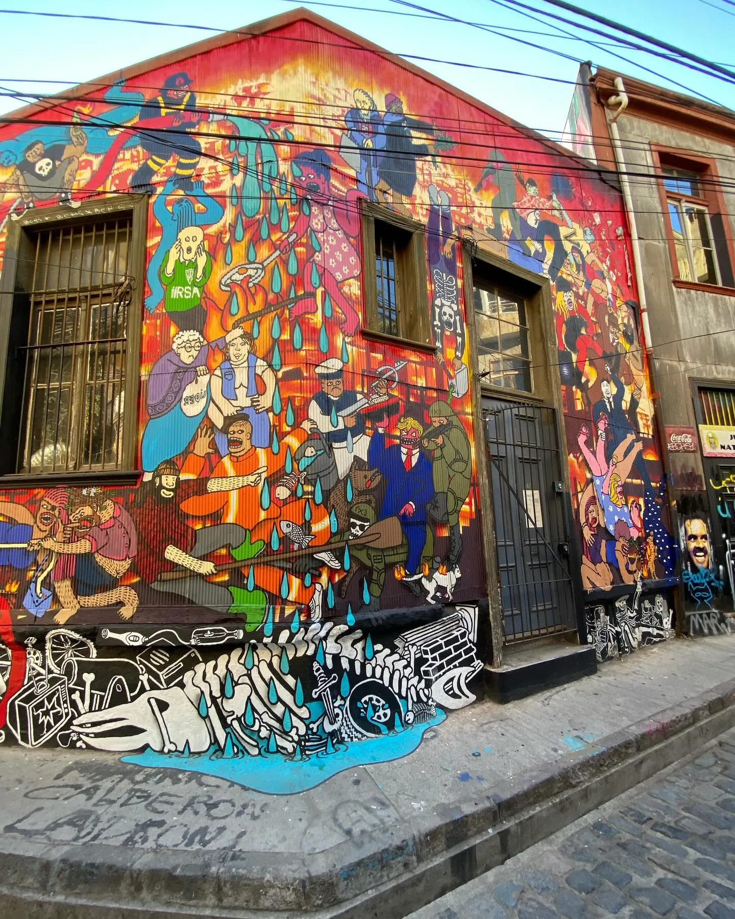 Colorful murals inside the hidden Pasaje Bavestrello tunnel in Valparaiso Chile