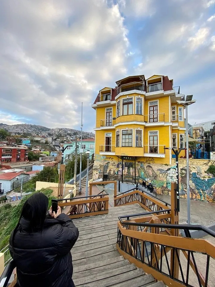 Colorful cobblestone path of Paseo Dimalow in Valparaiso Chile with ocean views