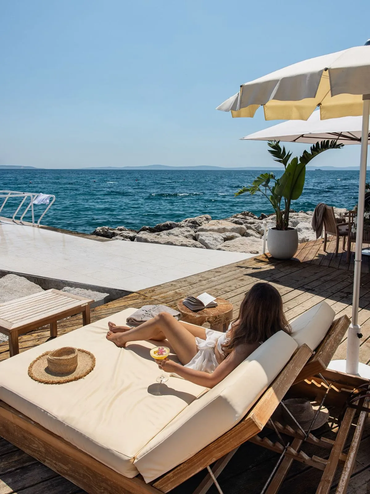 Charming stone house with blue shutters on a Croatian island