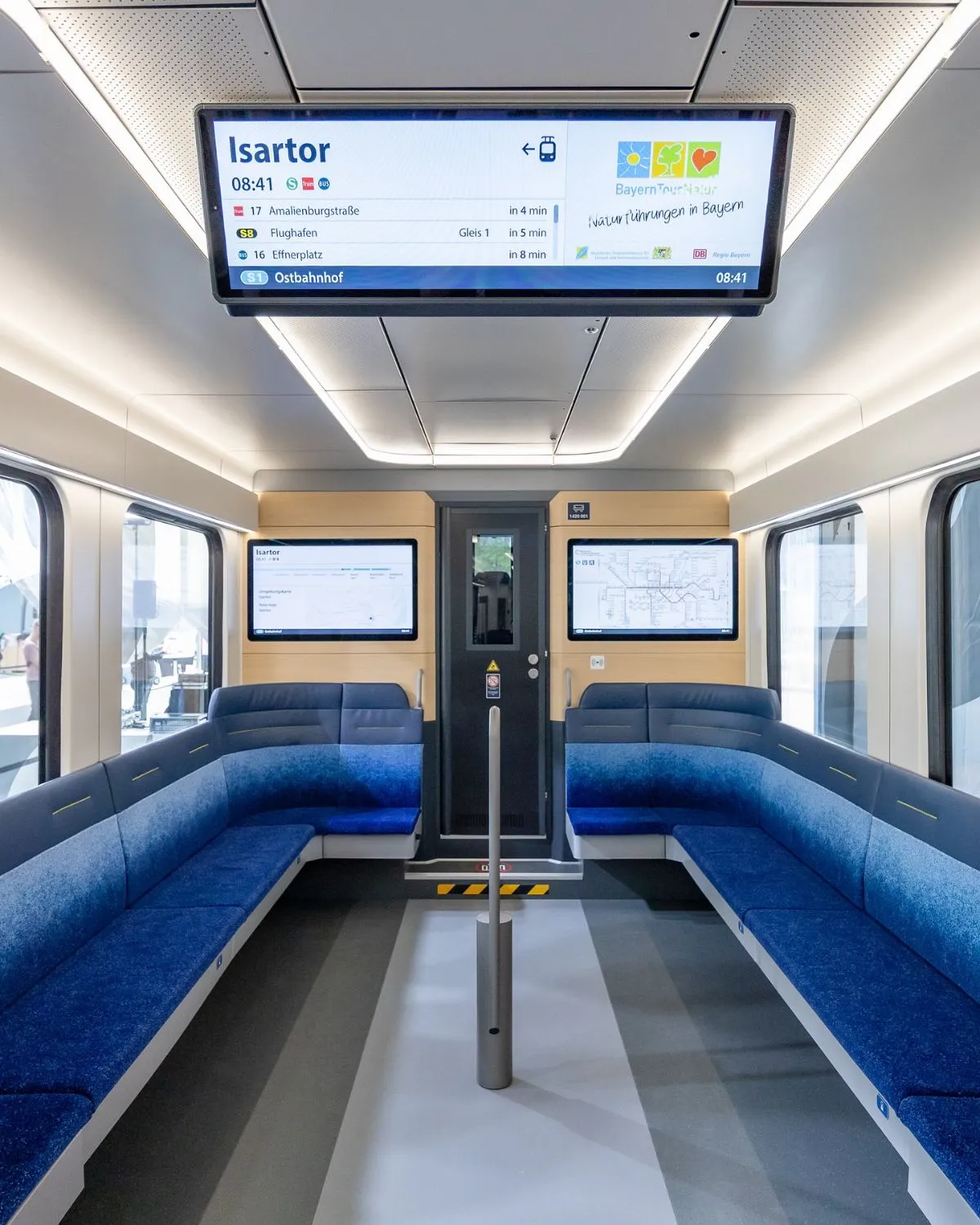 Designated stroller and bicycle parking area inside a German regional train