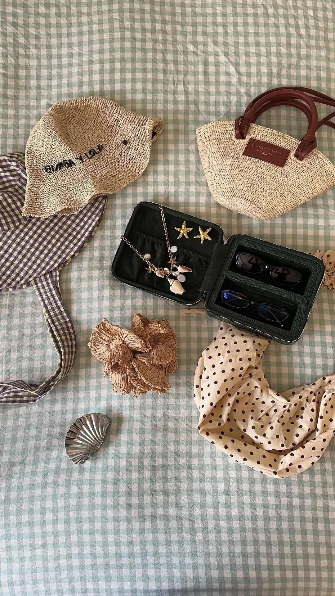 Straw bag and sunglasses on table in Key West