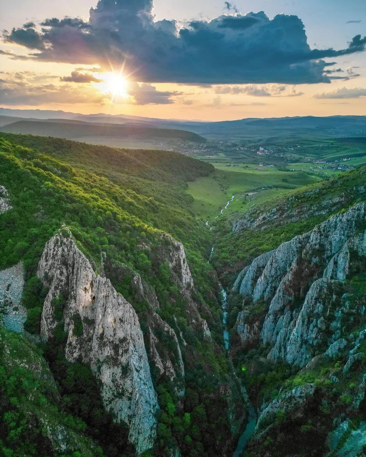 Aerial view looking down from the ridge into the deep split of Turda Gorge