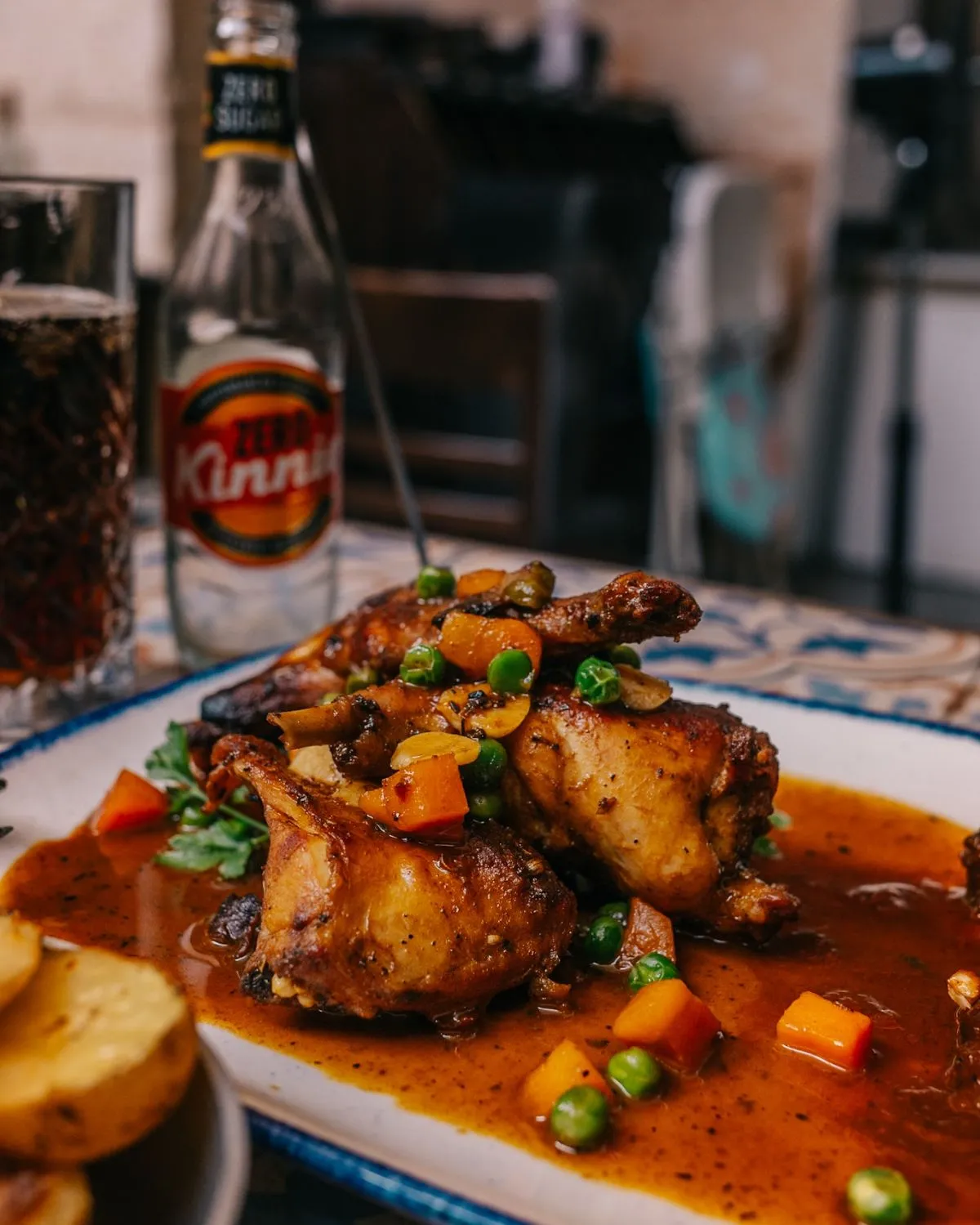 Artistically plated roasted rabbit loin dish in a fine dining restaurant in Malta