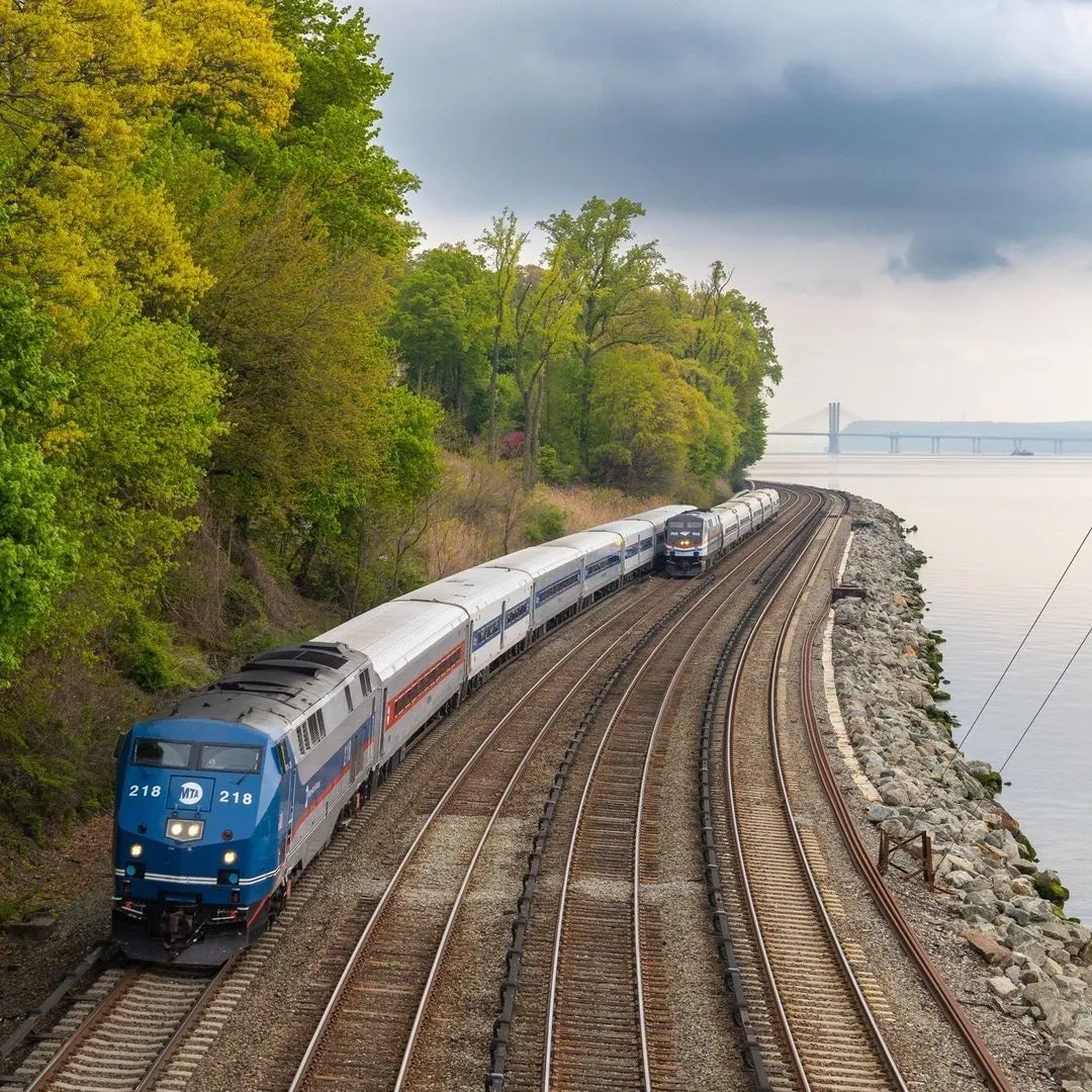 Metro North train traveling along the Hudson River near Cold Spring