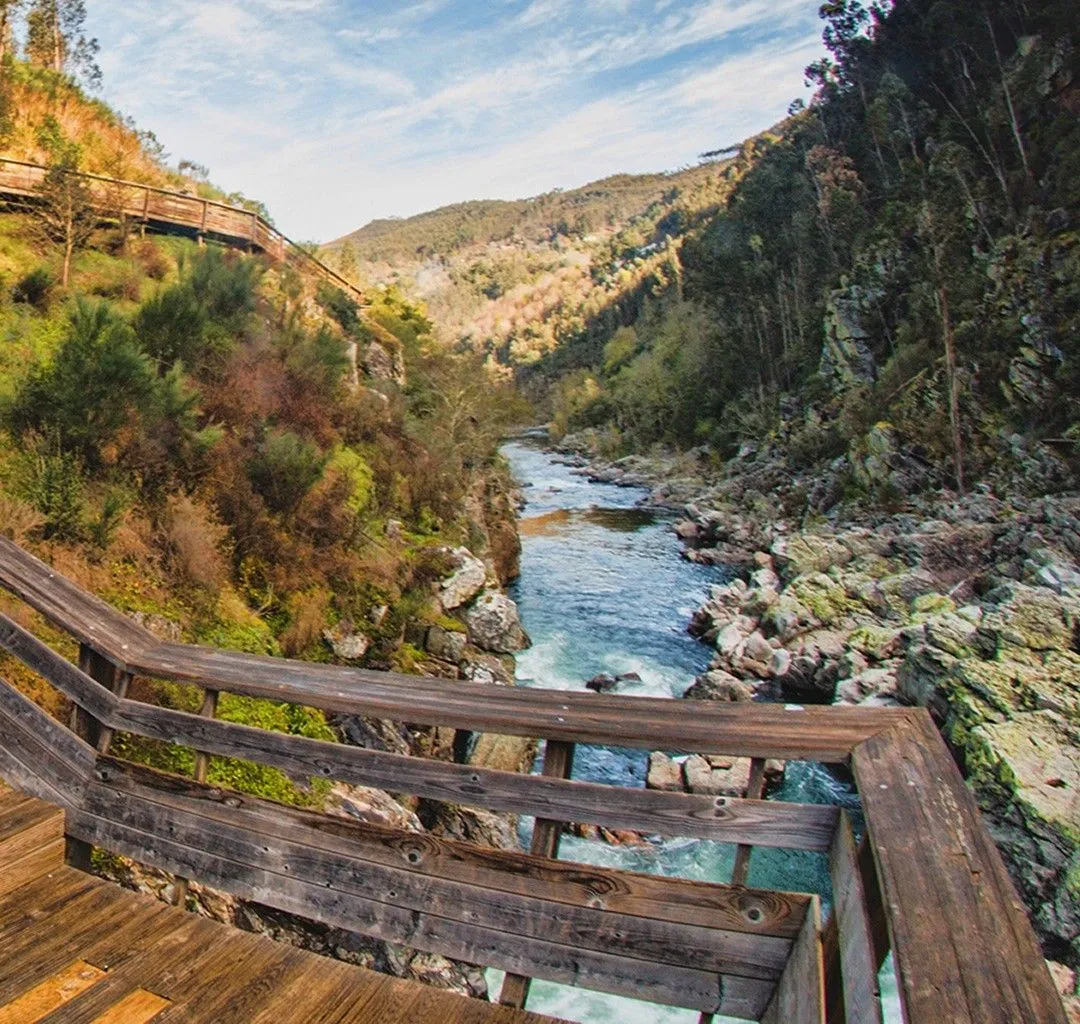 Wooden stairs of the Paiva Walkways winding up the rocky cliffs in Arouca Geopark