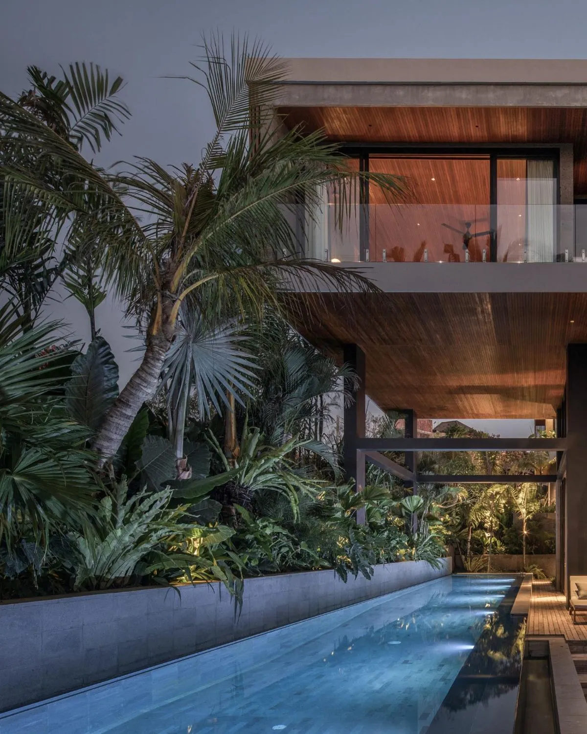 Luxury industrial boutique villa with private pool overlooking rice paddies in Pererenan Canggu for a romantic couple escape.