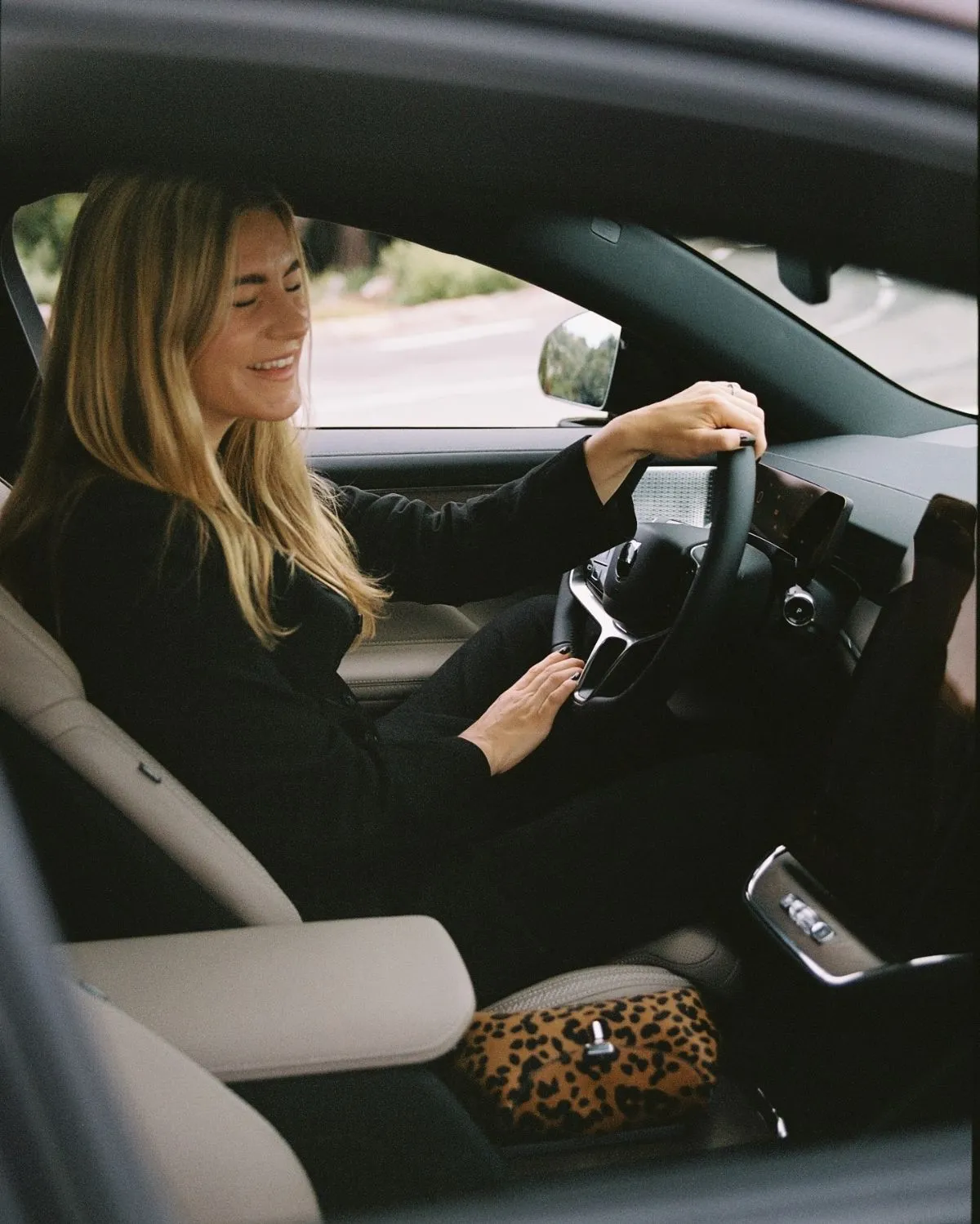 Driving down a tree-lined D-road in the French countryside