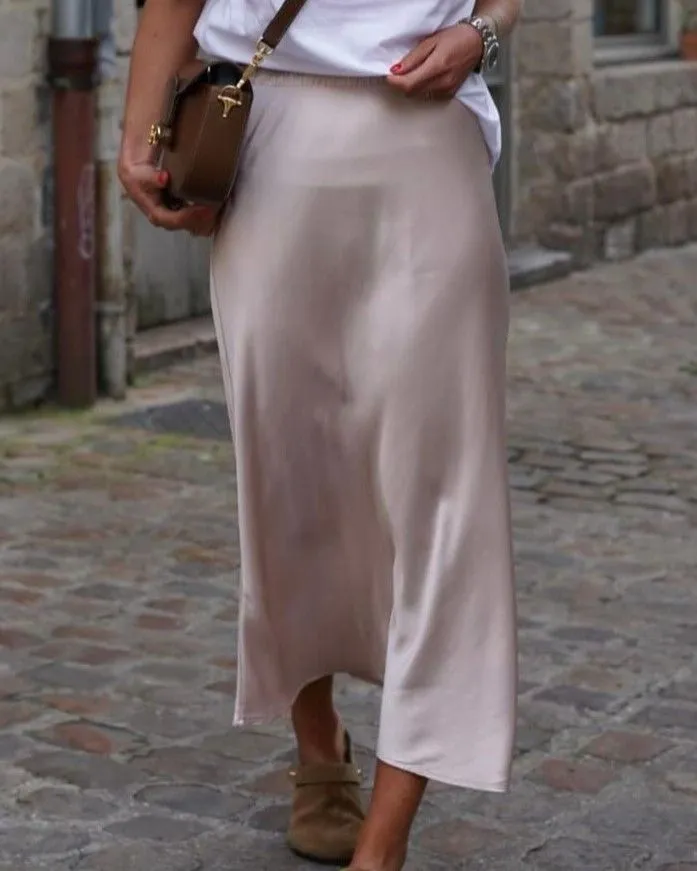 Close up of silk skirt fabric texture at a parisian cafe table