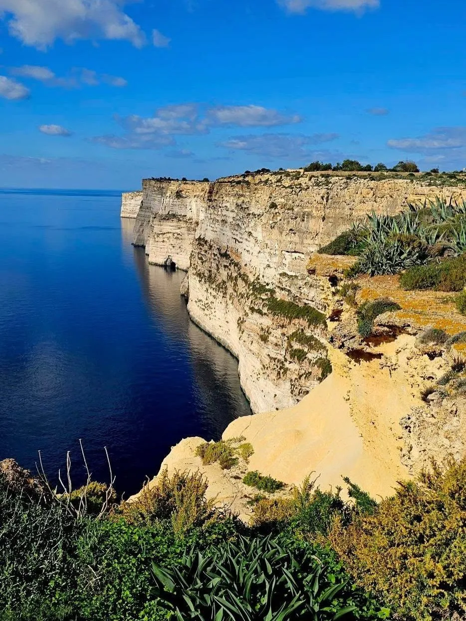 Dramatic vertical limestone cliffs at Ta