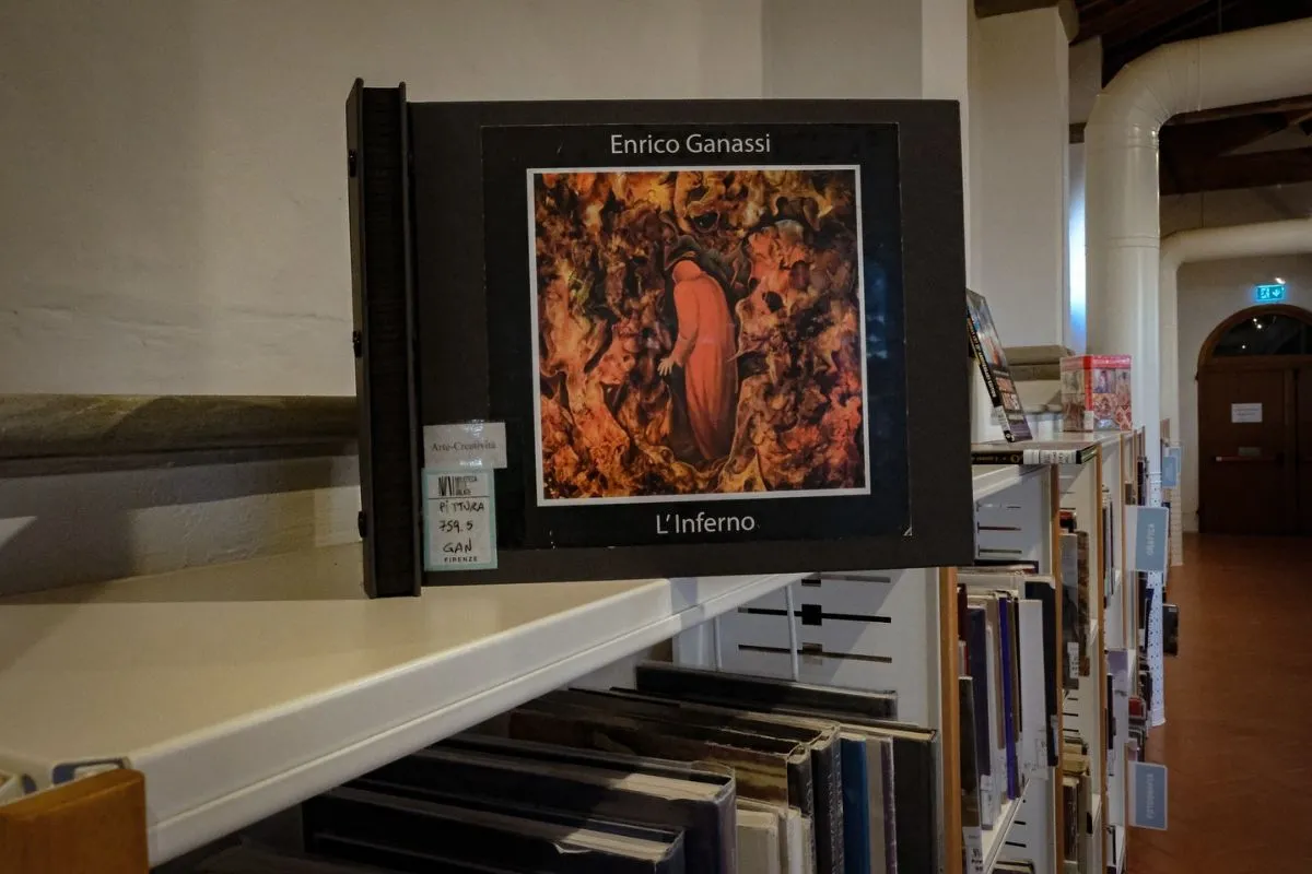 The historic stone entrance and courtyard of the Biblioteca delle Oblate in Florence