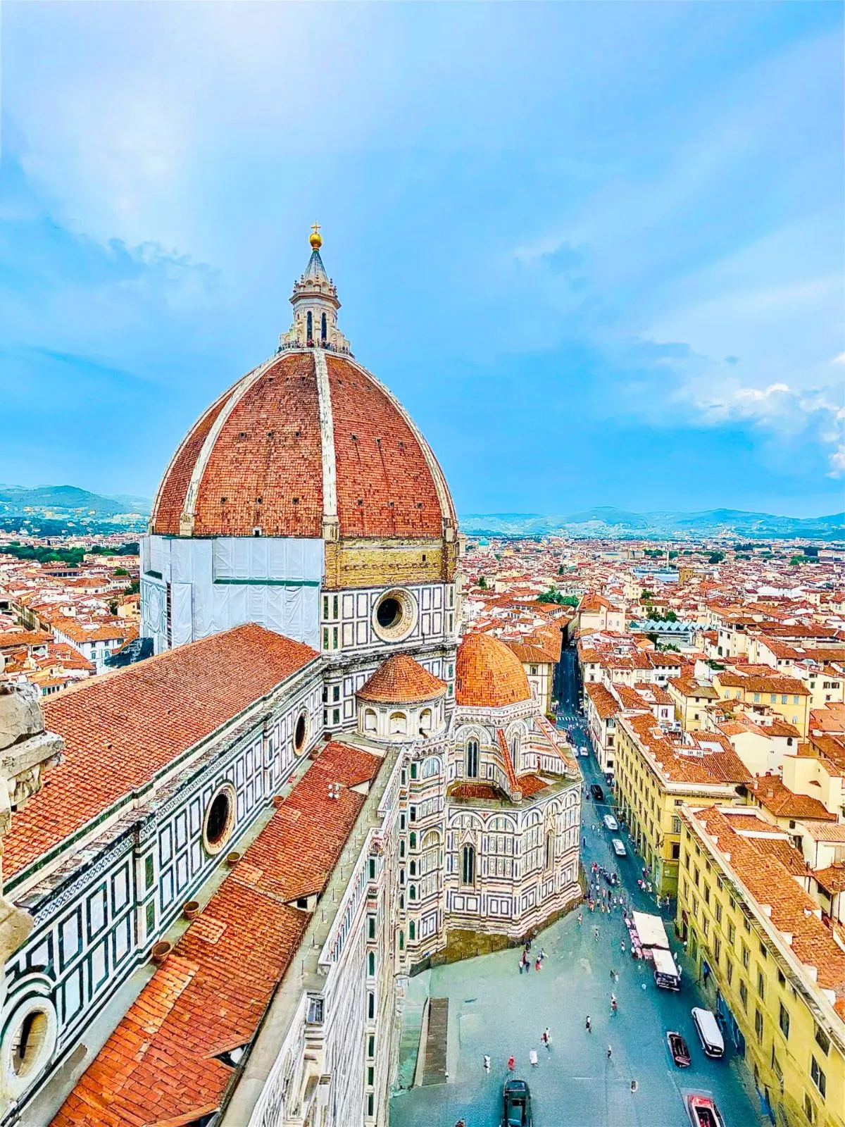 Renaissance masterpieces and sculptures under the stone arches of the Loggia dei Lanzi in Piazza della Signoria, Florence.
