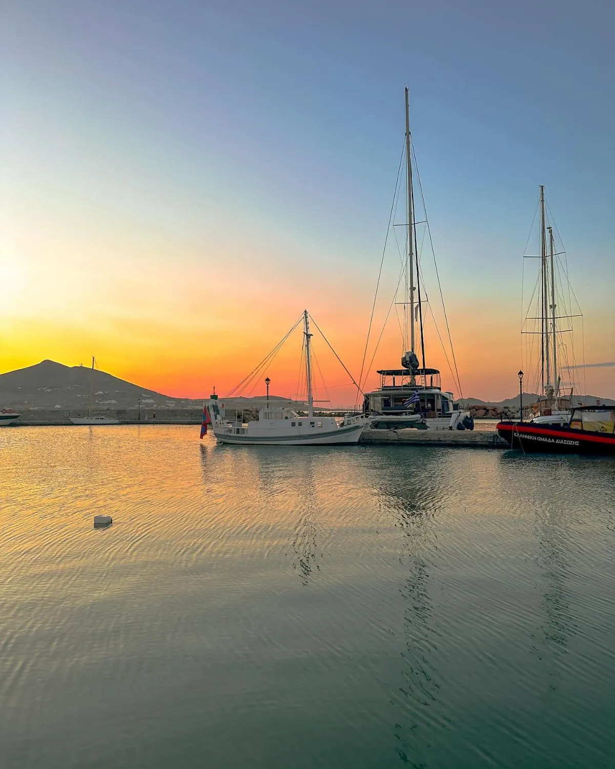 Traditional fishing boats in the harbor of Naoussa village