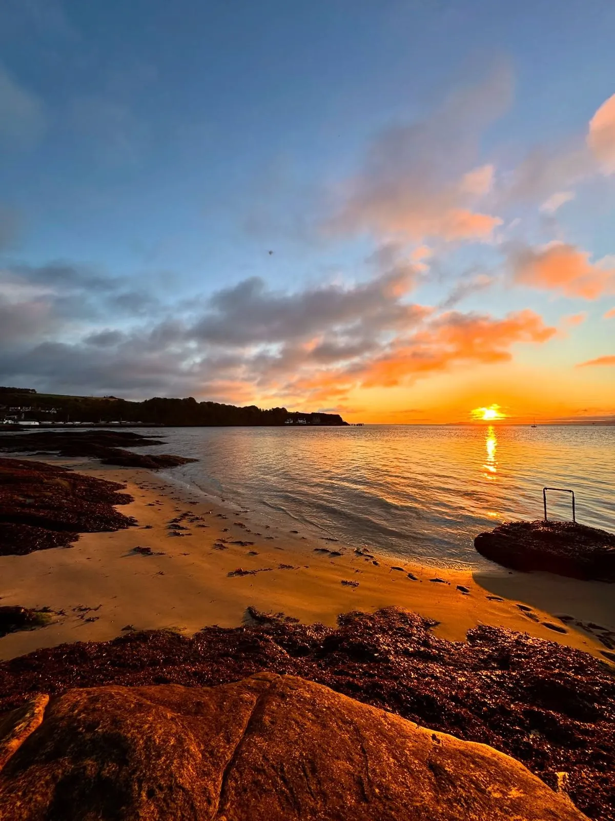 Scenic coastal trail heading towards Silver Sands beach near Aberdour Castle