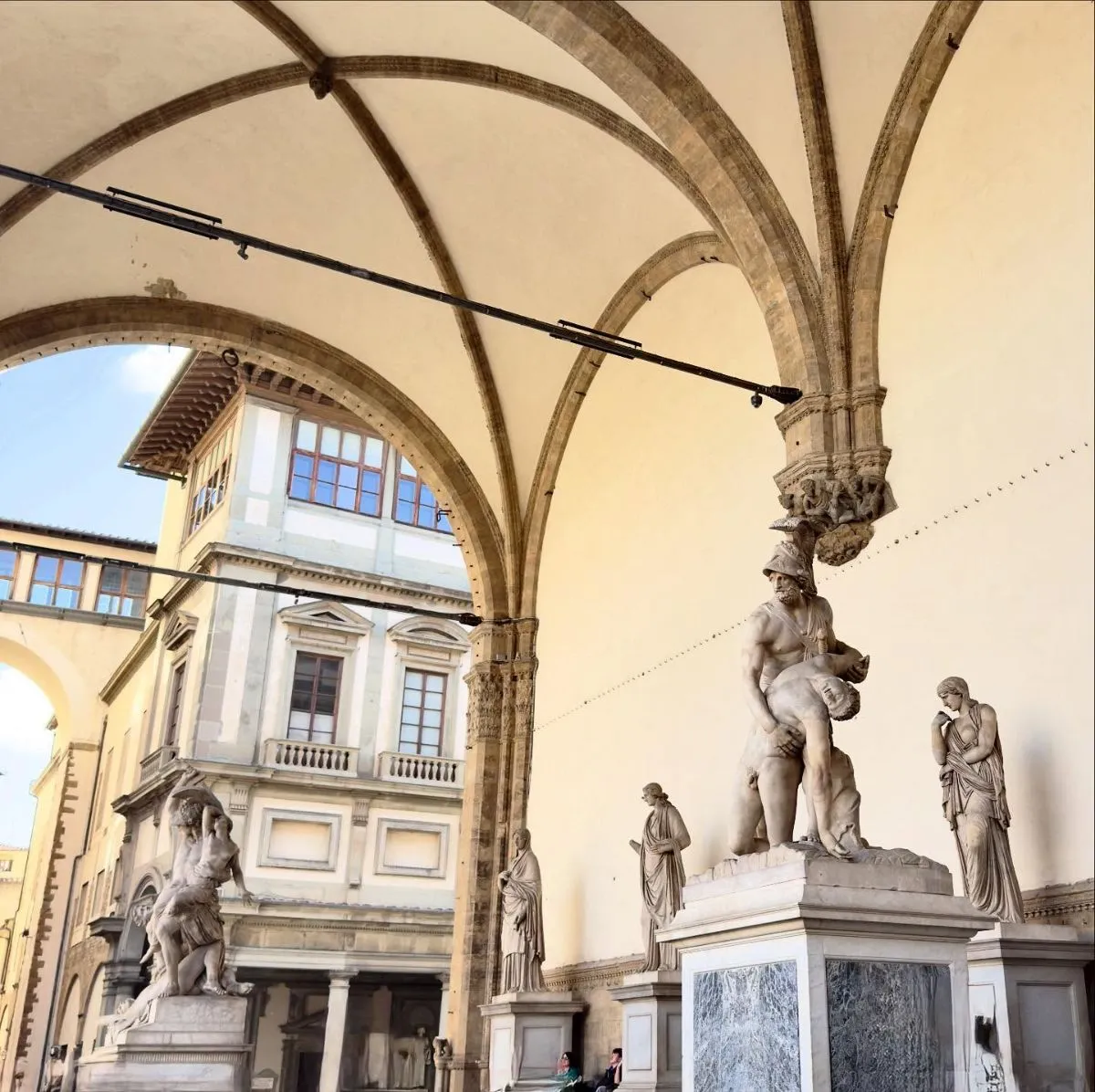 View of Palazzo Vecchio from under the arches of Loggia dei Lanzi
