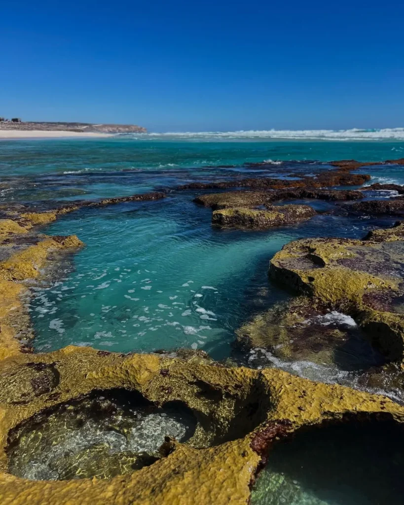 Natural rock pools at Playa Agua Blanca on the Oaxaca coast