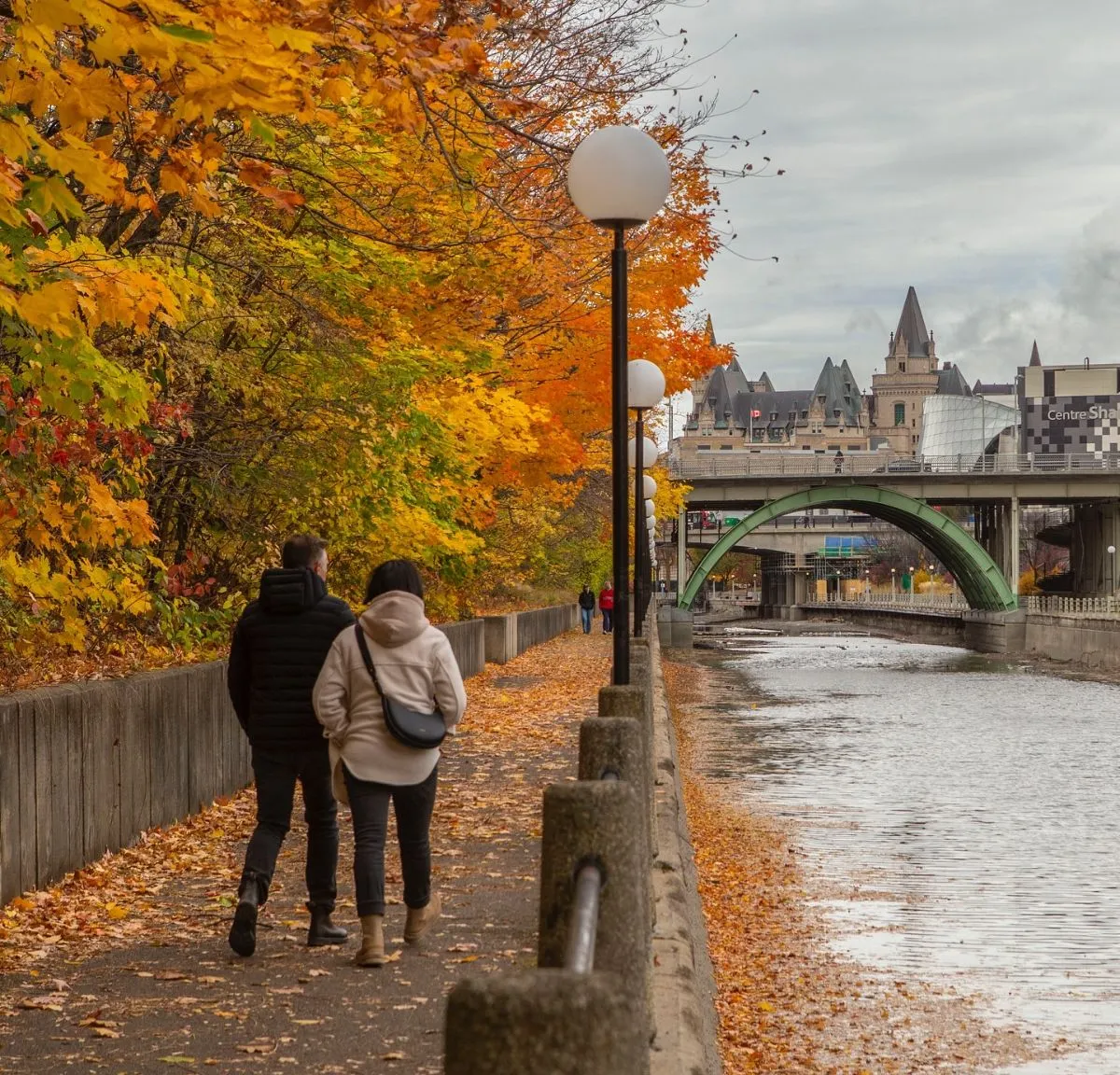 Peaceful pedestrian path along the Rideau Canal with historic locks