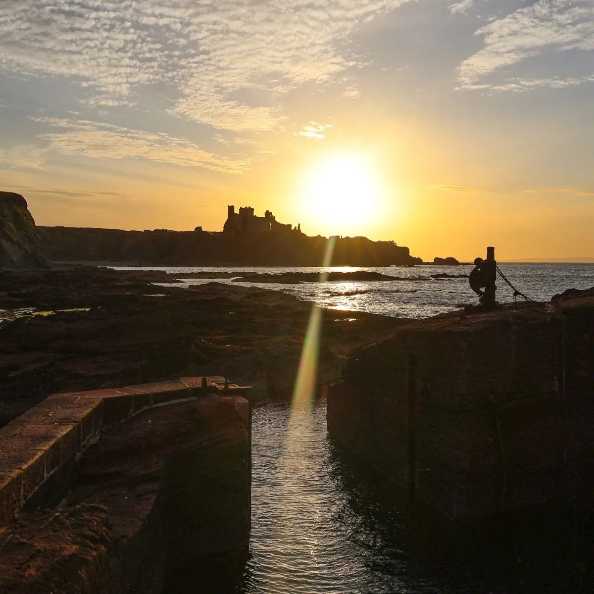 Seacliff Beach in Scotland with Tantallon Castle ruins in the background