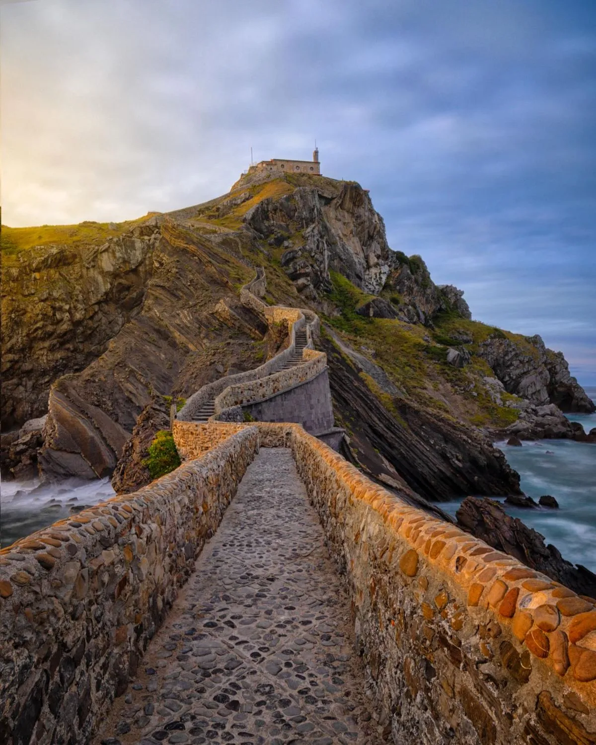 Steep stone staircase winding up to San Juan de Gaztelugatxe hermitage