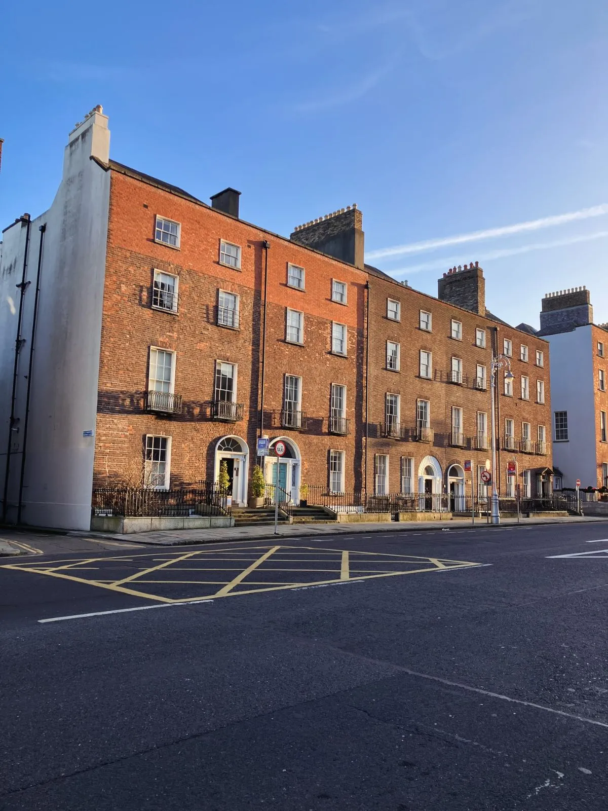 Cobblestone streets and red brick buildings in The Liberties neighborhood of Dublin