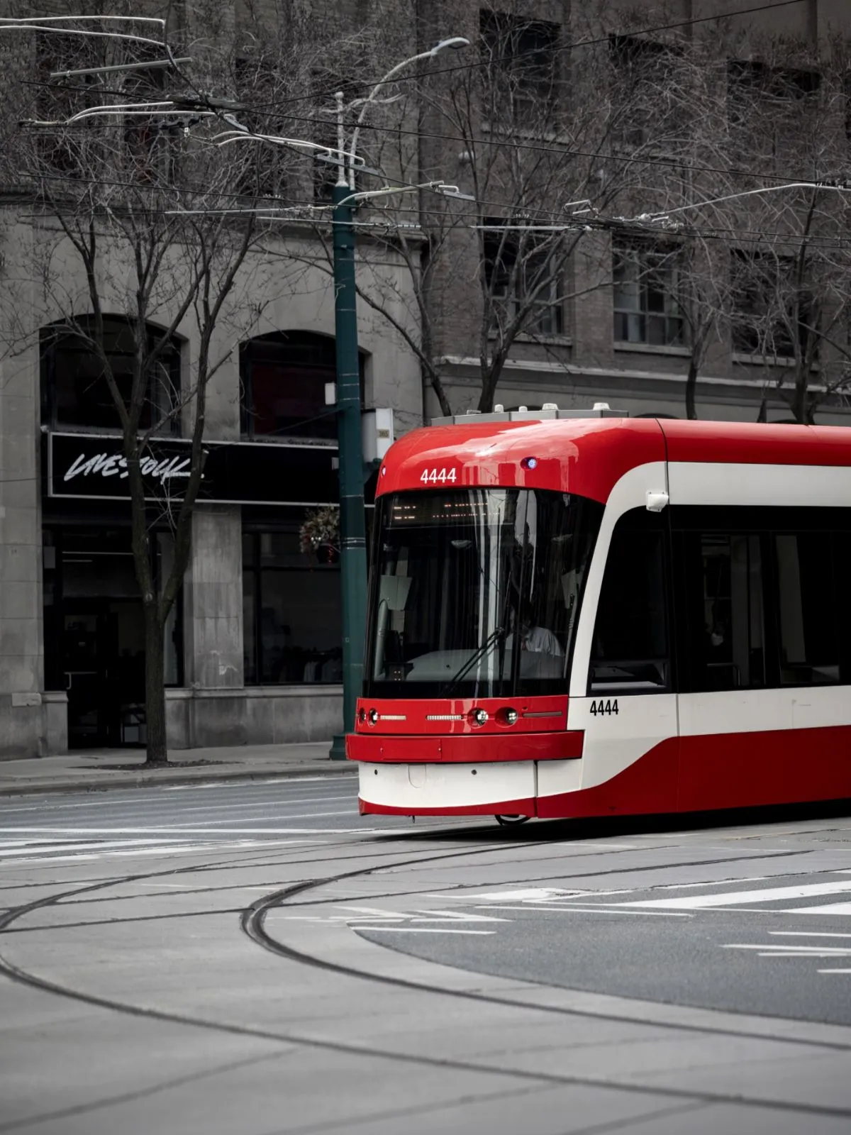 Iconic red streetcar in Toronto providing safe public transit