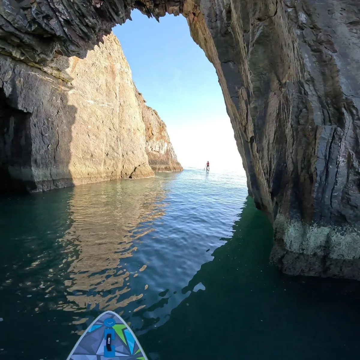 The famous Arch Rock limestone formation seen from the water