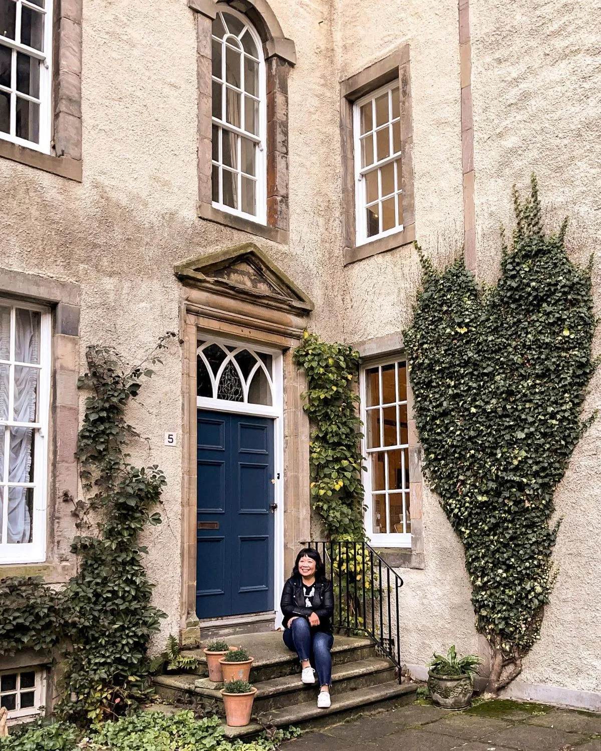 Heart shaped ivy on a stone wall inside Chessels Court off the Edinburgh Royal Mile