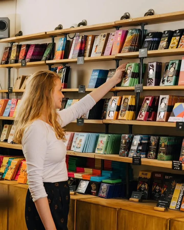 Artisanal Scottish chocolate bars on wooden shelves