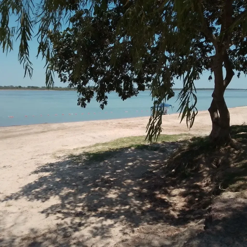 Safe swimming area marked on the Parana river beach