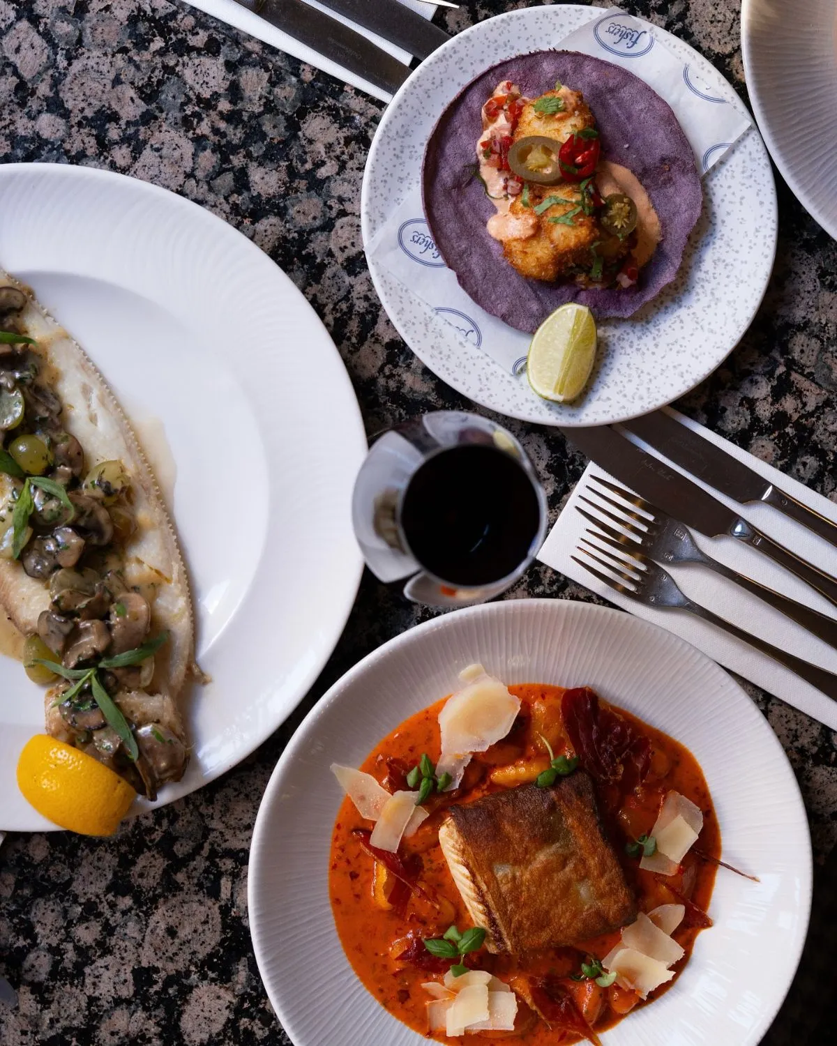 Beautifully plated seafood dish at a waterfront restaurant in Leith