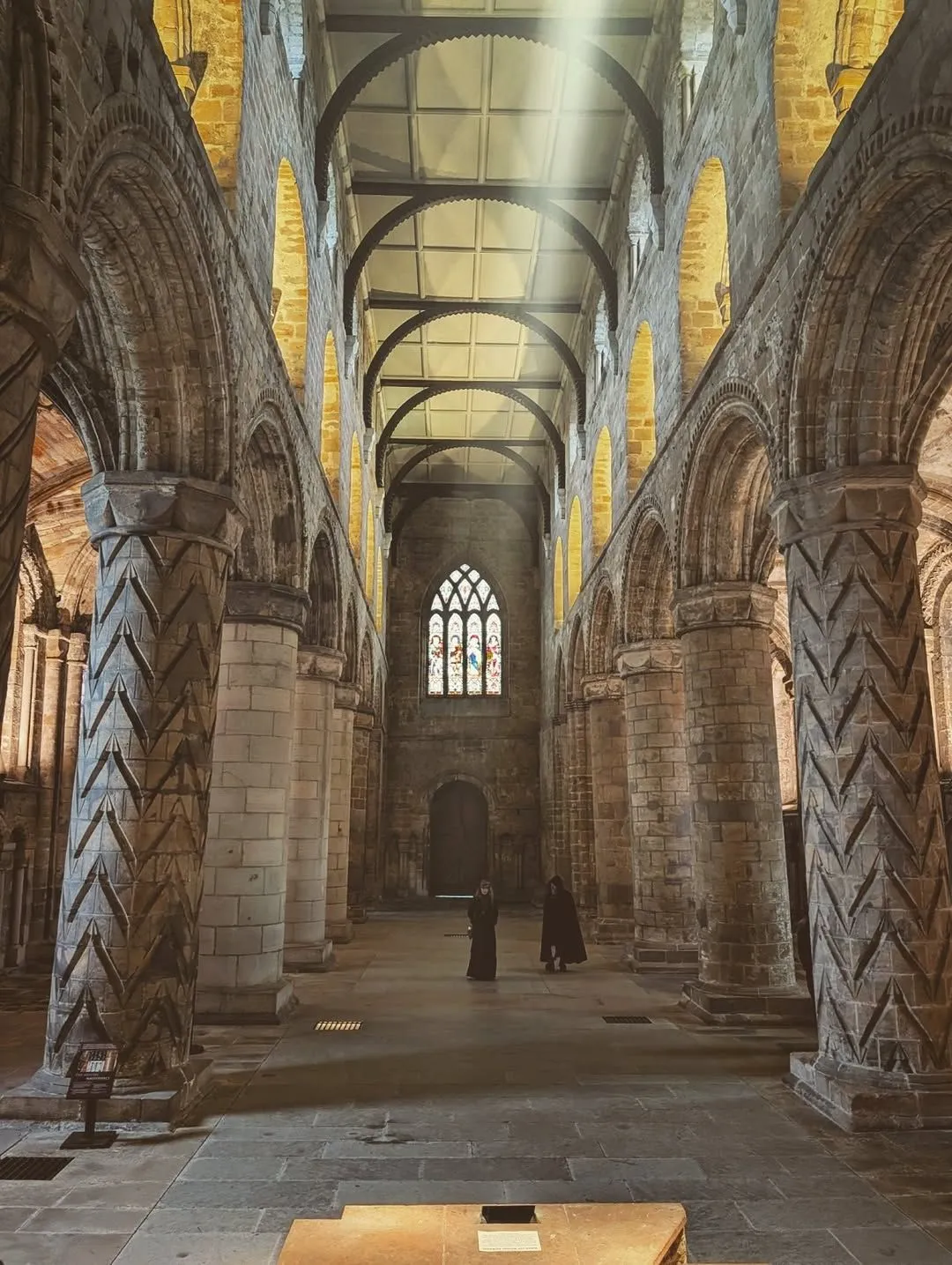 Close up of gothic stone window frames at Culross Abbey ruins.