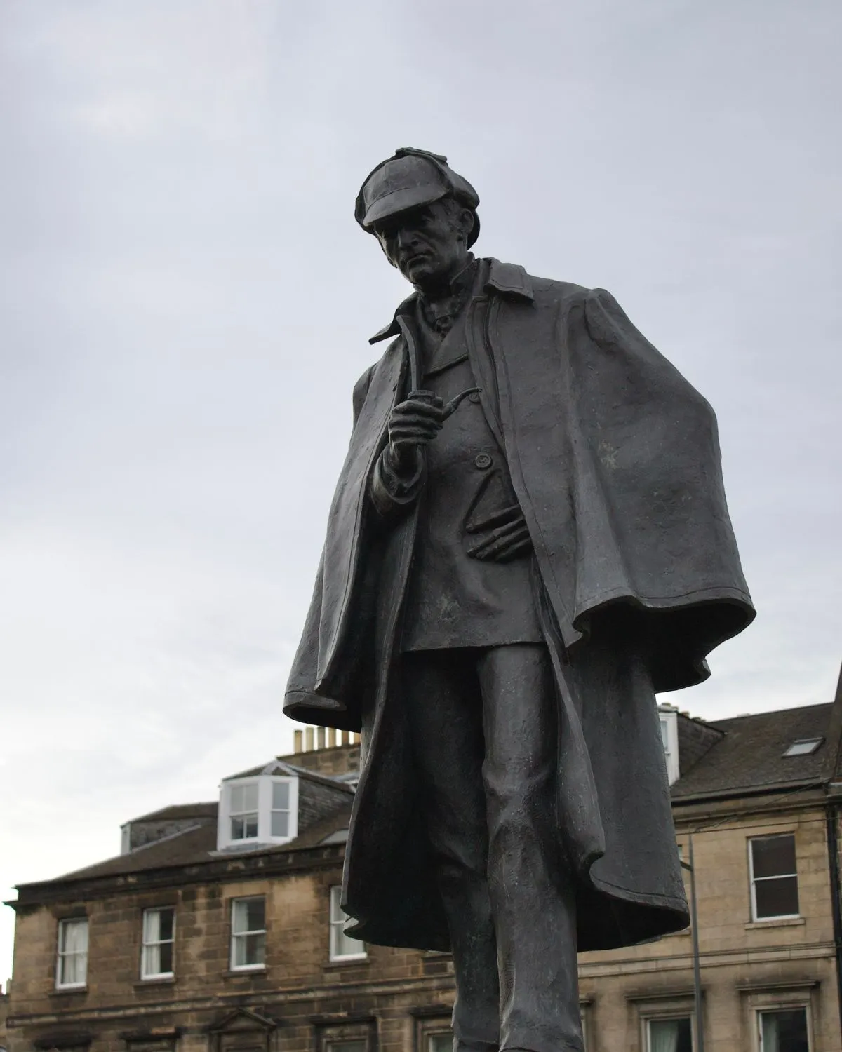 Bronze statue of Sherlock Holmes located in Edinburgh near his creator