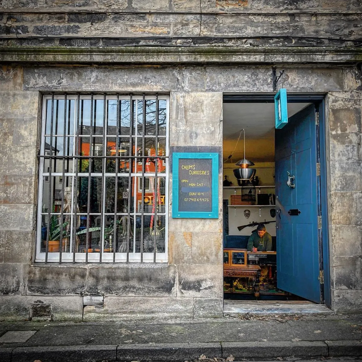 Detailed stone masonry and a colourful front door in the Stockbridge Colonies