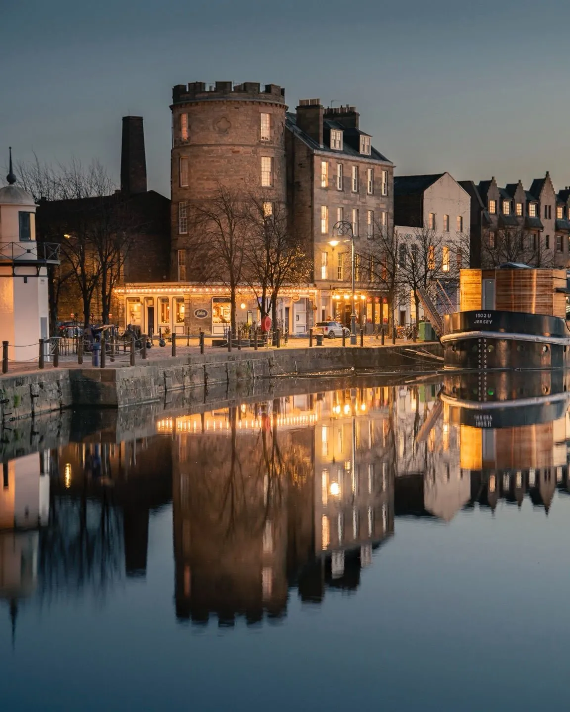 Outdoor dining and historic buildings along The Shore in Leith