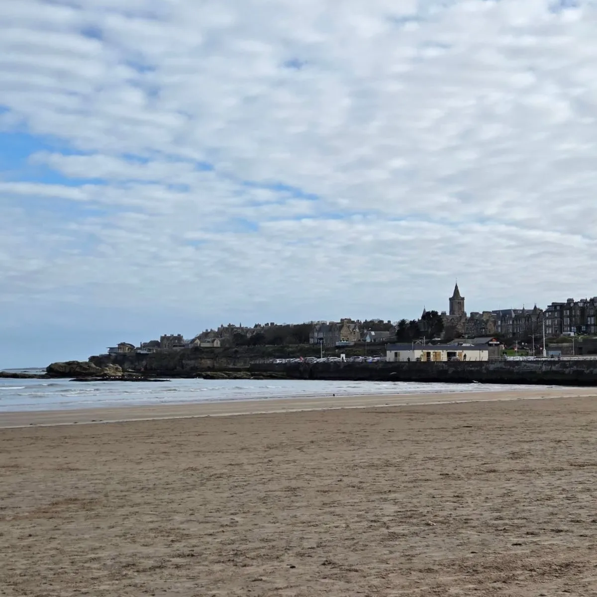 West Sands beach stretching along the St Andrews coast