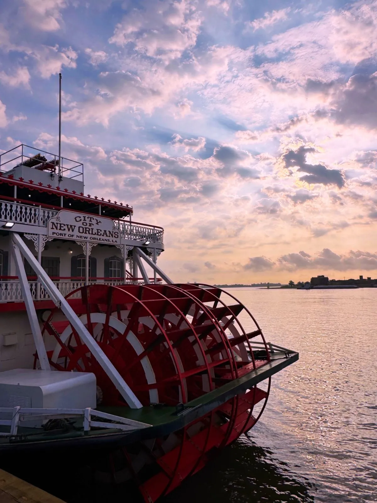 Sunset view of a steamboat on the Mississippi River from Woldenberg Park