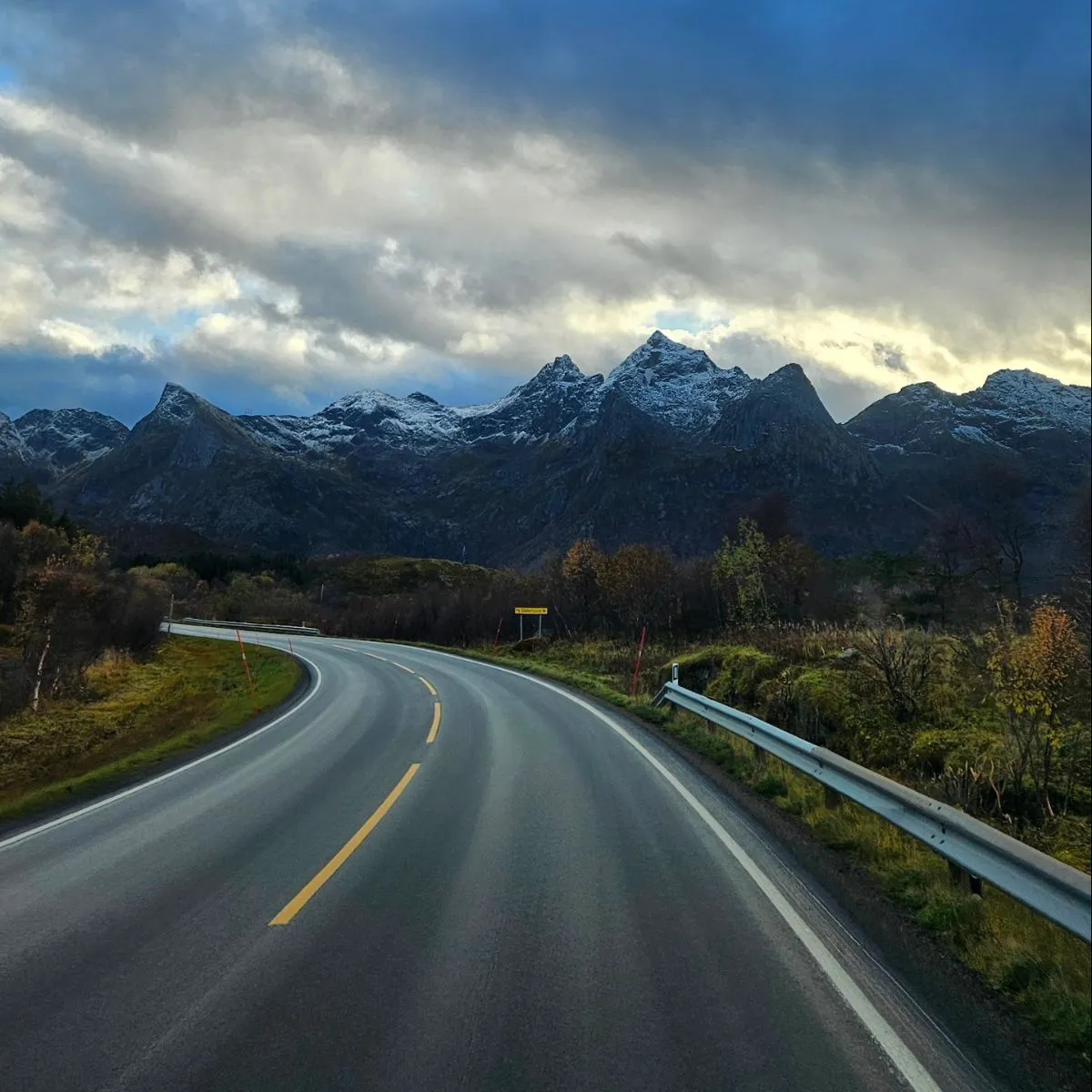 Driving along the winding coastal road to Vikten Beach