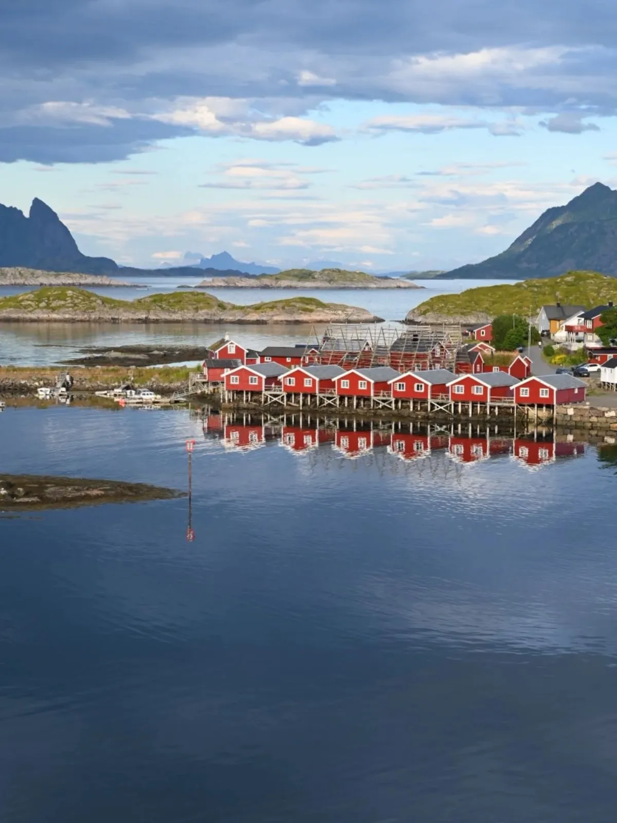 Small passenger ferry approaching the island of Skrova in Lofoten