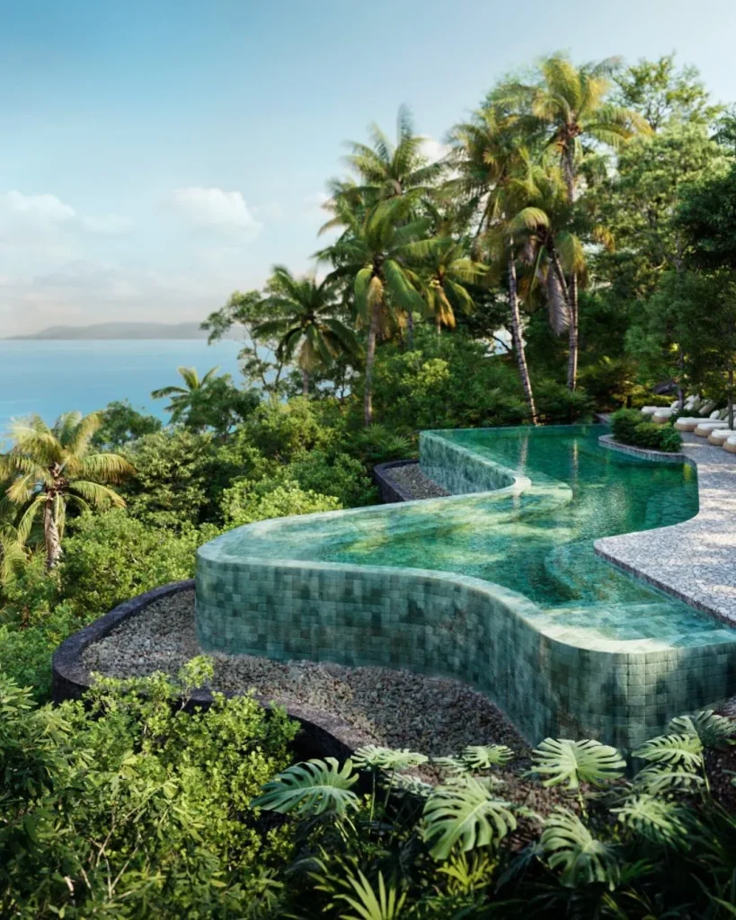 Luxury private villa with an infinity pool overlooking the ocean at Leela Beach in Koh Phangan at sunset, ideal for a 30s traveler attending the Full Moon Party.